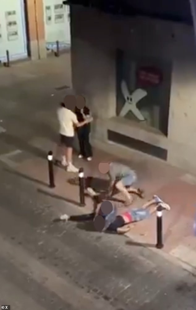 A disturbing video shows the police officer lying on the ground as he holds the man in a deadly chokehold