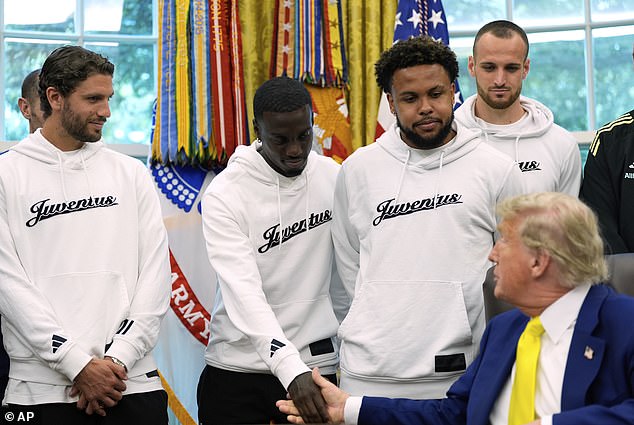 Timothy Weah (pictured shaking Trump's hand) admitted it was 'weird' and that he had been caught by surprise when Trump went on his tirade
