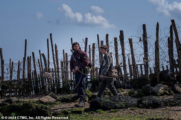 23 years on from the original which saw a deadly virus plague London, the new movie finds a group of survivors living on the secluded island of Lindisfarne, where the virus is yet to reach (Pictured: Aaron Taylor-Johnson as Jamie and Alfie Williams as Spike)
