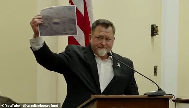 While speaking in front of Congress on May 1, he held up what he said was a never-before-seen image of a cruise ship–sized craft he claimed was spotted hovering 21,000 feet in the air over the western US. It was quickly debunked