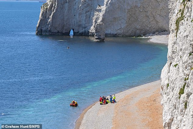 Emergency services were called to a medical emergency on the beach at Durdle Door in Dorset and could be seen giving CPR to a patient
