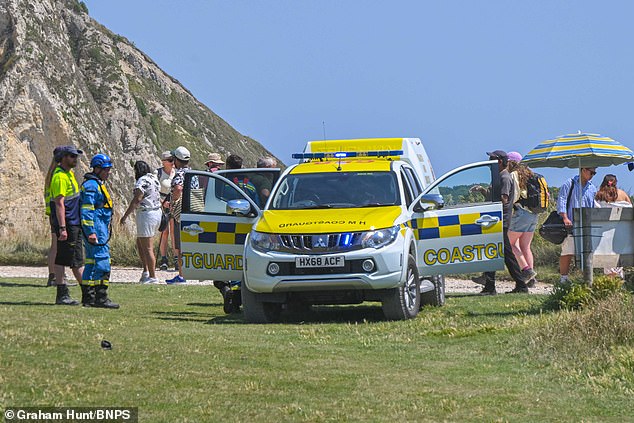 A coastguard vehicle is seen parked on the beach where a woman in her 30s has died earlier today