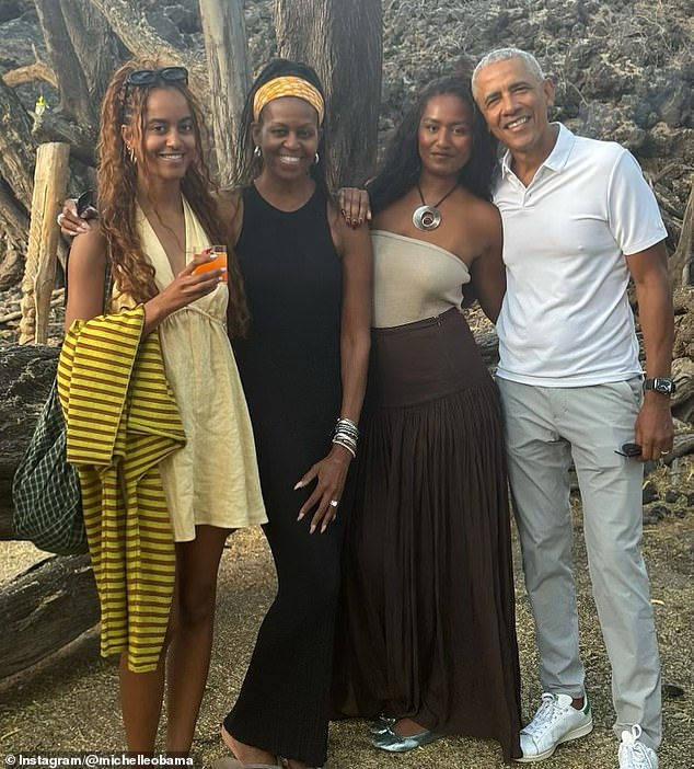 The former first lady said people calling her Mrs. Obama 'changes the dynamic.' She and Barack are seen with daughters Malia and Sasha