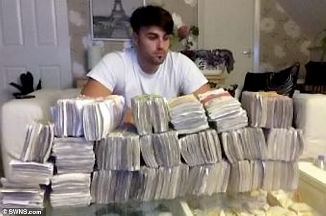 A judge ruled that he would not be deported despite attempts from the Home Office because there was not enough evidence to suggest he had been involved in criminal activities before (pictured with a stash of £250,000 in cash)