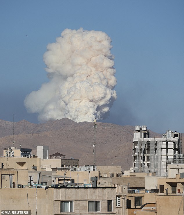 Smoke rises from an Israeli attack in Tehran on Wednesday. Insiders say Iran is 'running out of options' and could turn to its proxies to carry out cyber and terrorist attacks in the US