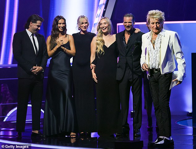 The model, 45, and her siblings Sean, 44, Ruby, 37, Renee, 32, and Liam, 30, surprised their famous dad on stage at the ceremony as he was honoured with the Lifetime Achievement Award