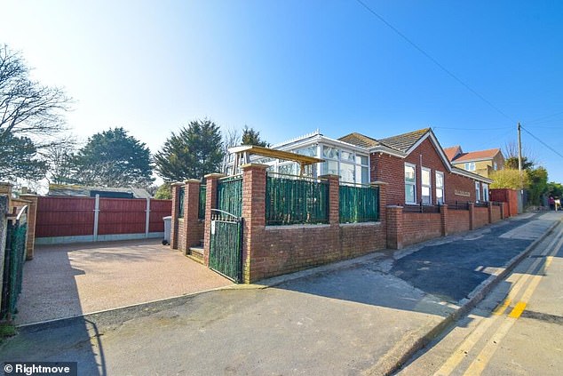 An outdoor are provides an off-street parking area if wanted by its future owner