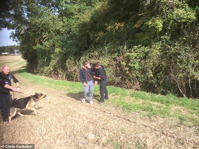 In one photo taken by Chris on his farm a police dog jumps up at one man as cops collar a suspect