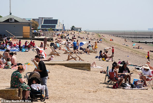 People enjoy the warm weather yesterday afternoon on Jubilee Beach in Southend-on-Sea, Essex