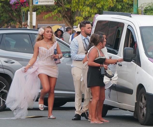 Taxi! Time to head home for this group of racegoers eager to get out of the sun