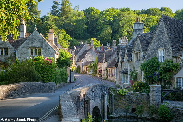 Another trend is for tourists to attach their phones to cottage windows so that they can take shots of themselves against the backdrop of the street behind