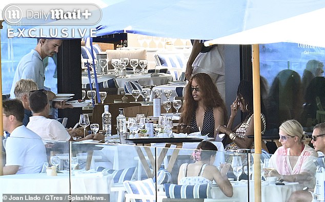 Michael and James (pictured, seat left) have been longtime friends of the Obamas and hosted the family many times at their Rancho Mirage home in Palm Springs, California .
