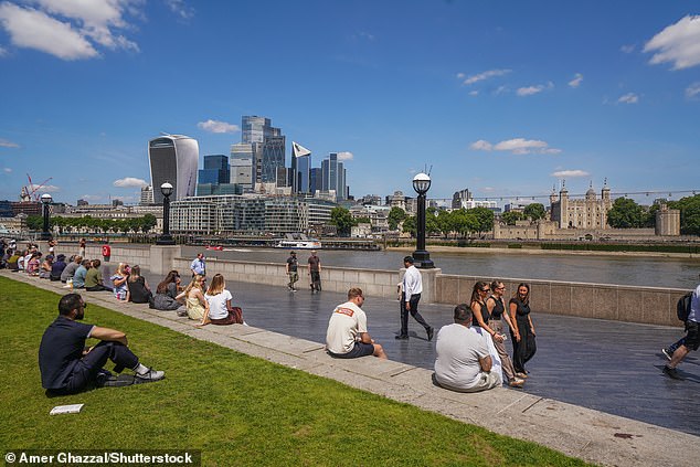 Prior to humans affecting the climate with greenhouse gasses, June would only see a day reaching 32°C (90°F) once every 2,500 years. Now, it occurs once every 25. Pictured: People enjoying the sun in Potters Fields, London