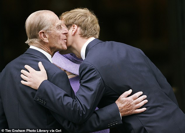 William greets his grandfather at the tenth anniversary memorial service for his mother at Guards Chapel at Wellington Barracks on August 31, 2007