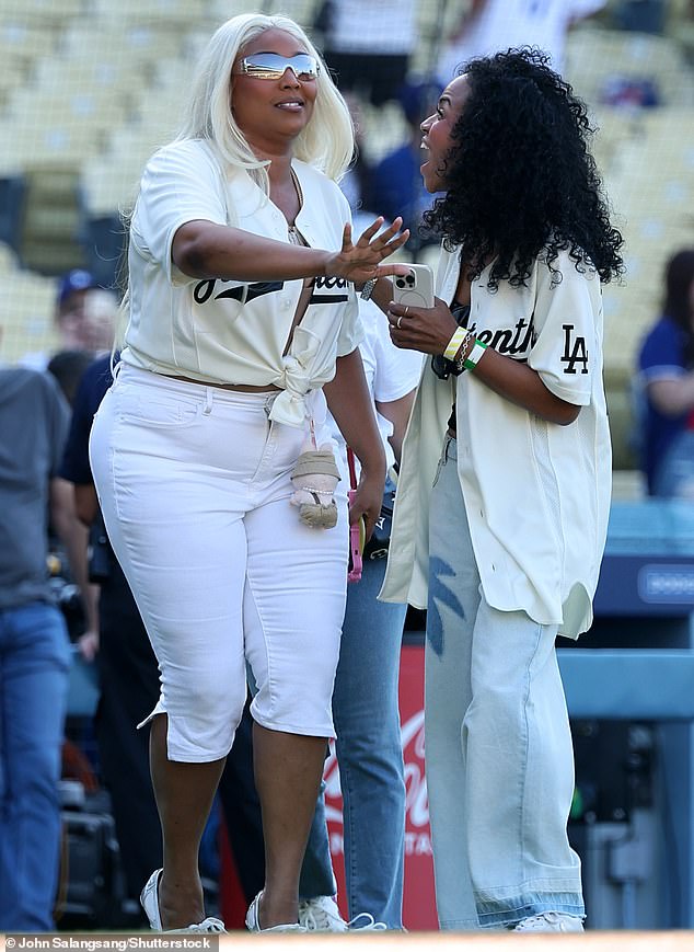 The singer sported a pair of fitted white capri pants as well as a cropped shirt that had 'Juneteenth' embroidered on the front