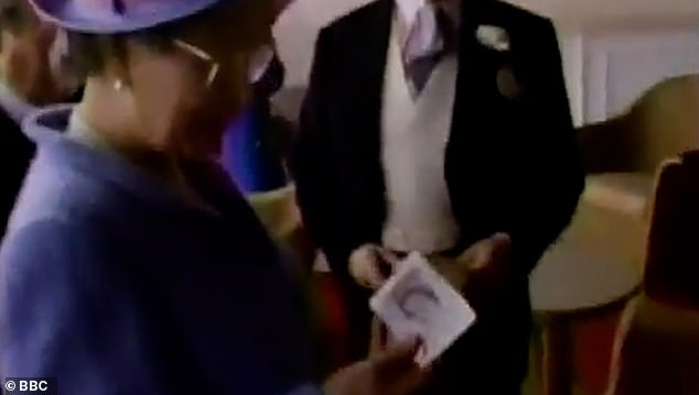 'Sixteen pounds! Oh!' said the Queen, smiling broadly to the camera