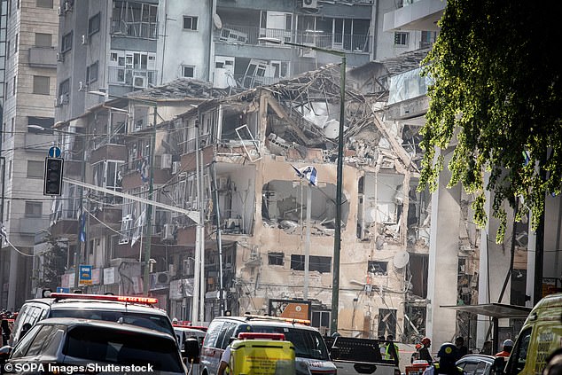 An Iranian ballistic missile hit a building in southern Israel (pictured) early Thursday while also striking the main hospital in the region