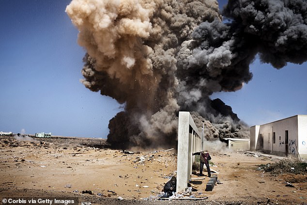 President Donald Trump has given Iran a two-week grace period to begin negotiating its nuclear capacity in a last-ditch effort to avoid replicating the decade-long chaos in Libya (pictured)