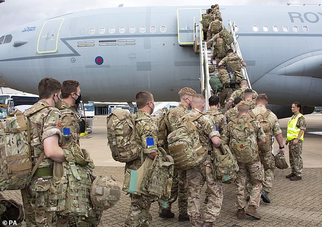 File image of soldiers boarding an RAF Voyager aircraft at RAF Brize Norton to take part in exercises to combat Russian aggression