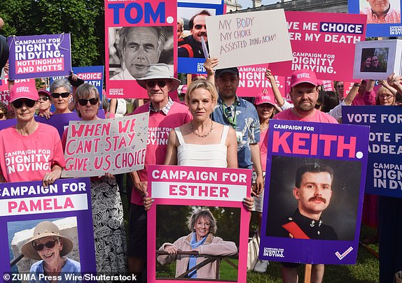 Mandatory Credit: Photo by Vuk Valcic/ZUMA Press Wire/Shutterstock (15366357d) Dame Esther Rantzen's daughter REBECCA WILCOX (c) joins campaigners from the group Dignity In Dying and supporters of the Assisted Dying Bill in Parliament Square as MPs continue to debate the bill. Assisted Dying Bill Protesters Outside The Parliament, London, England, United Kingdom - 20 Jun 2025