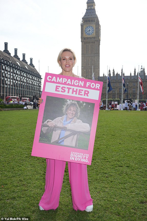 Dame Esther Rantzen's daughter Rebecca Wilcox supporting the Dignity in Dying protest in favour of the assisted dying Bill, in Parliament Square, central London, ahead of a debate on the Terminally Ill Adults (End of Life) Bill in the House of Commons. Picture date: Friday June 20, 2025. PA Photo. Photo credit should read: Yui Mok/PA Wire