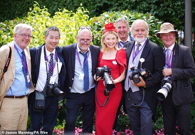 Georgia Toffolo beams as she poses with the photographers at Royal Ascot on Friday afternoon
