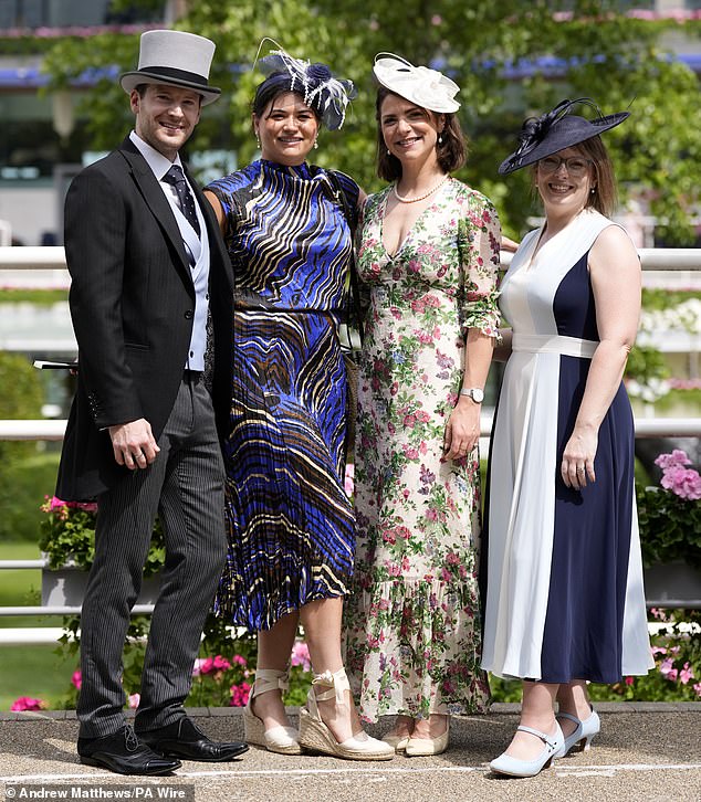 Other revellers decided to opt for more toned down colours such as white and navy frocks and fascinators