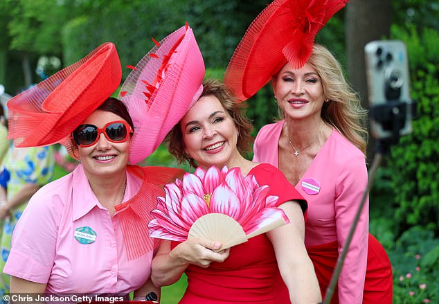 One revellers showed off her creative fan in the pattern of a lotus flower as she waved it around to keep herself cool
