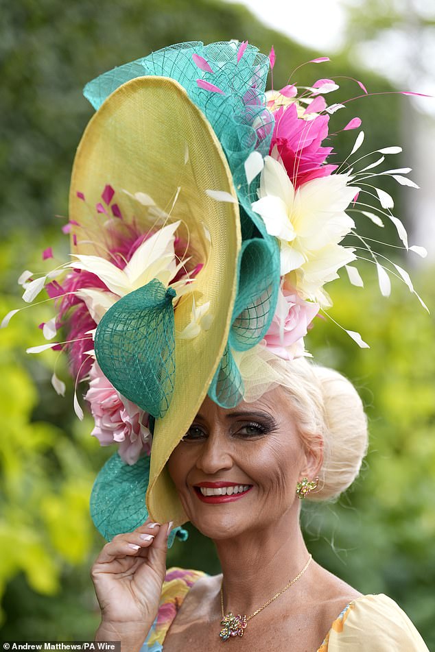 One woman attempted to steal the show with her impressive fascinator consisting of emerald green, rose pink and butter yellow hues