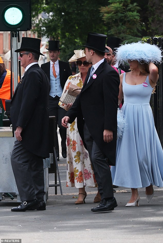 As ever, lavish millinery turned heads, with many revellers commanding attention in vibrant creations adorned with feathers, flowers and lace