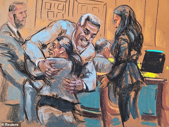 Sean "Diddy" Combs hugs his lawyer Nicole Westmoreland as he enters the courtroom during Combs' sex trafficking trial in New York City, New York, U.S., June 16, 2025 in this courtroom sketch. REUTERS/Jane Rosenberg
