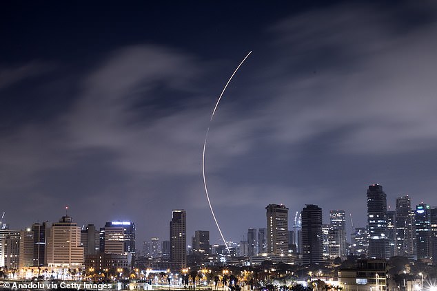 Israel's 'Iron Dome' air defense system responds to incoming Iranian ballistic missiles as seen from Tel Aviv, Israel on June 18, 2025.