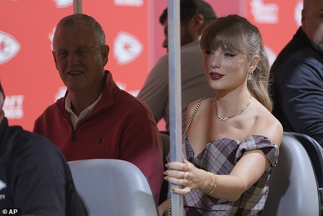 Taylor was snapped arriving in a cart with her dad before the start of an NFL football game between the Kansas City Chiefs and the New Orleans Saints last October