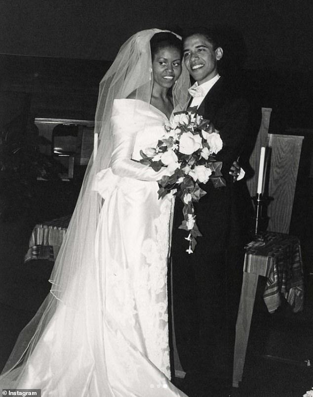 Michelle and Barack Obama are pictured together on their wedding day in October 1992