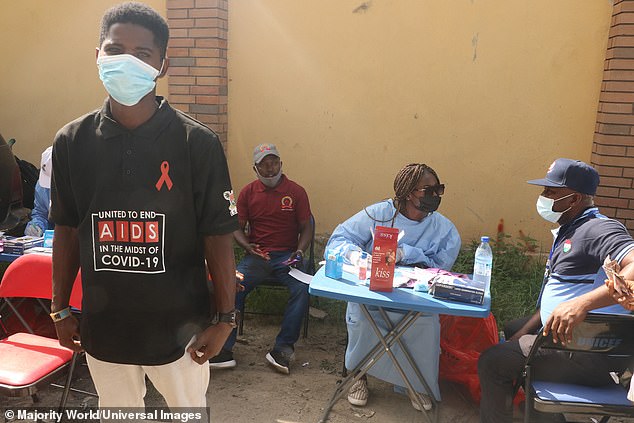 The Trump administration has taken a hardline stance against providing aid, urging other countries to shoulder the burden of prevention measures (Pictured: Health workers providing care in Nigeria)