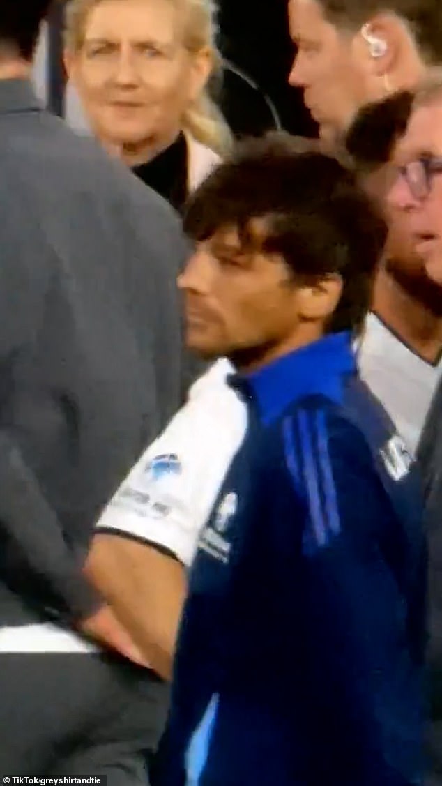 In a video obtained by MailOnline from Old Trafford on Sunday, the One Direction star is seen turning away from the Made In Chelsea favourite, awkwardly avoiding any interaction