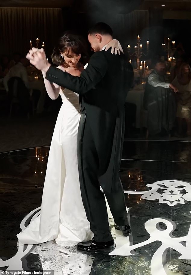 The beauty looked on cloud nine as she shared a romantic first dance with her husband