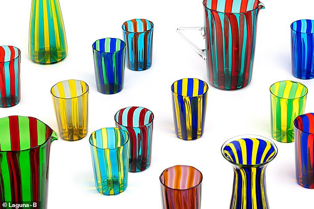 The handmade glassware features bright colors, stripes, and floral details. All of the glasses have different motifs and designs, with one large-size cup running customers $167