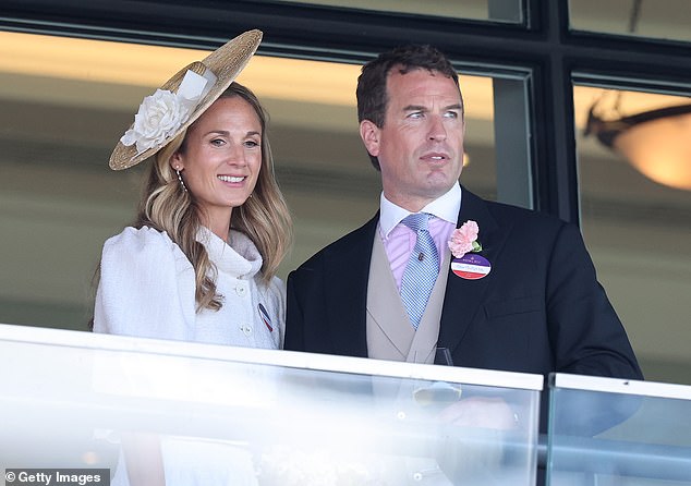 Harriet Sperling and Peter Phillips smile as they attend day one of Royal Ascot at Ascot Racecourse on June 17