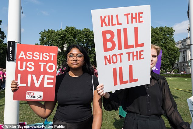 Campaigners and their supporters gather outside Houses of Parliament to demonstrate their opposition to assisted dying