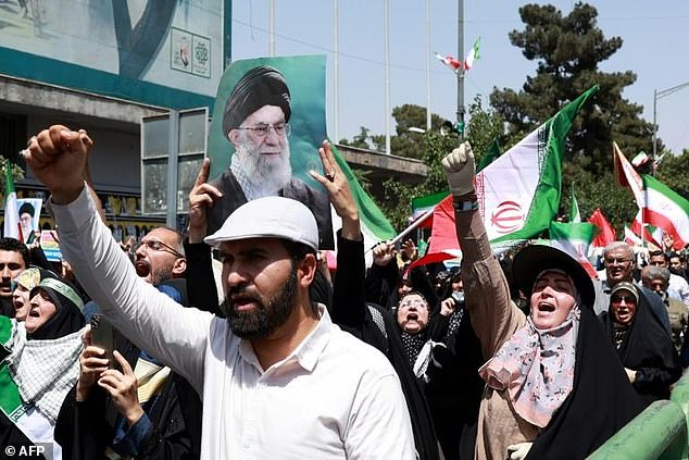 Iranians rally in Tehran in support of their leaders