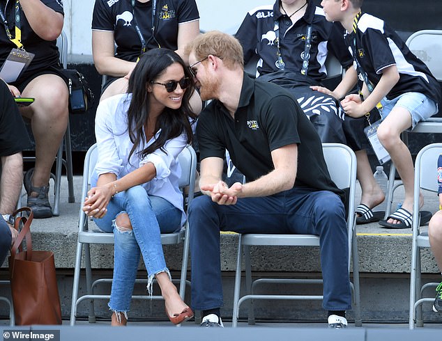 Meghan Markle and Prince Harry attending the Invictus Games in Toronto in 2017. There was online criticism of Meghan for apparently embarrassing the royals by wearing ripped jeans to the event