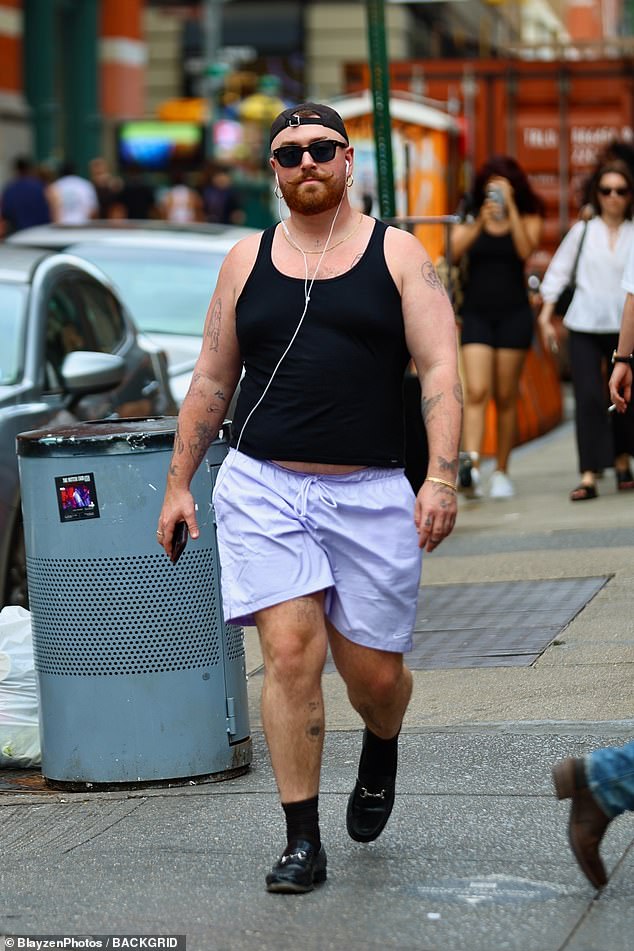 The singer, 32, showcased their unique sense of style as they stepped out in sport shorts and a black vest top