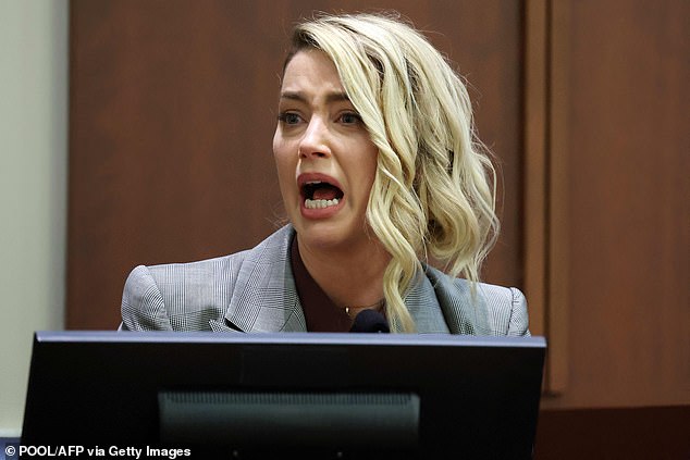 Amber Heard testifies during the Depp vs Heard defamation trial in May 2022. Heard is unable to pay her ex-husband Johnny Depp more than $10million in damages after the jury took the side of the Pirates of the Caribbean star