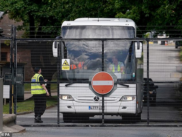 A coach with people thought to be migrants onboard, leaves Manston immigration short-term holding facility on July 10, 2023