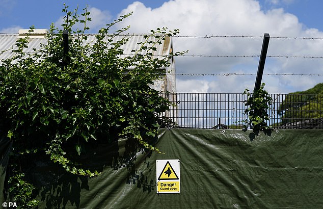 The Manston workers said they are told by the Home Office to refer to the thousands of migrants passing through the camp as 'residents' as if they are paying guests (file photo)
