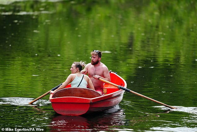 People on the boating lake at Highfields Park, Nottingham on June 20
