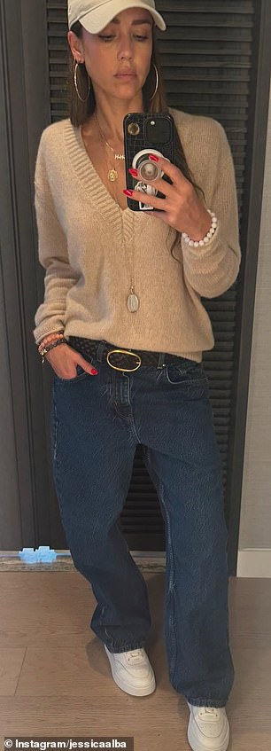 Another ensemble consisted of a slouchy oatmeal-colored sweater and jeans