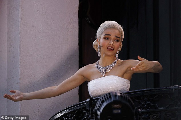 For her performance of the iconic song, Rachel donned a white strapless dress and sported a platinum blonde wig styled into a chignon