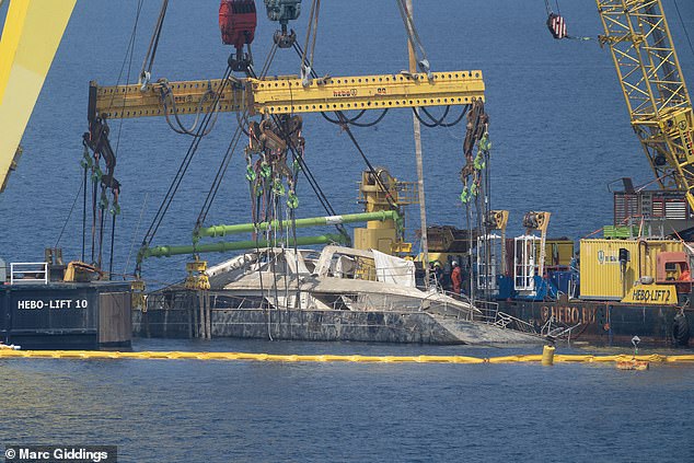 The super yacht Bayesian is raised to the surface off the coast of Porticello, Sicily
